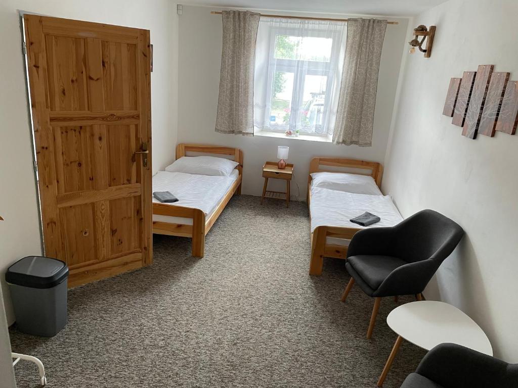 Postel nebo postele na pokoji v ubytování Apartmány u Pálavy