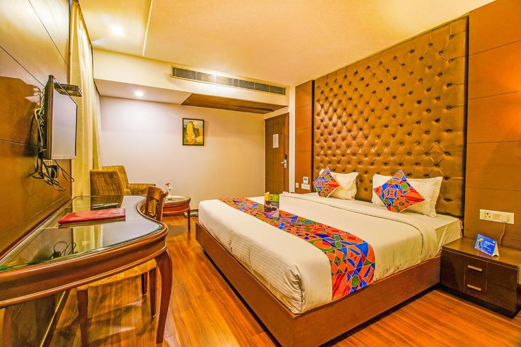 Ένα ή περισσότερα κρεβάτια σε δωμάτιο στο Hotel Wti Airport