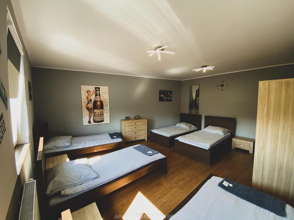 Posteľ alebo postele v izbe v ubytovaní Apartamenty Energo