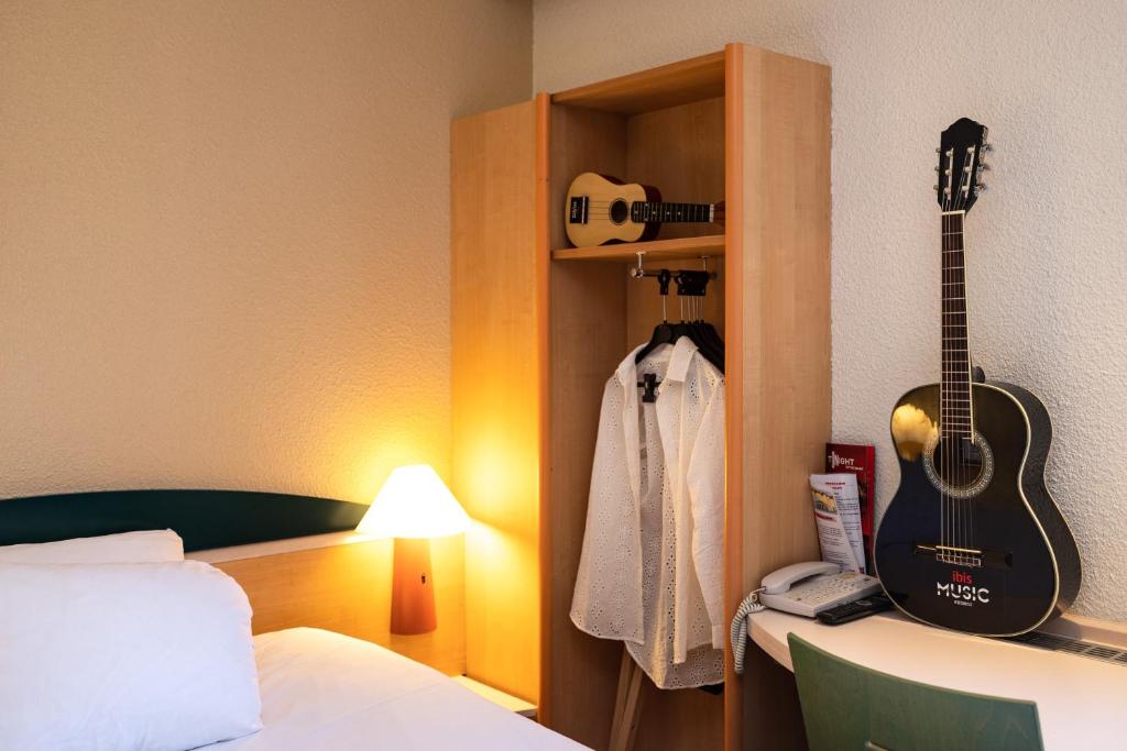 Postel nebo postele na pokoji v ubytování Hotel ibis Autun