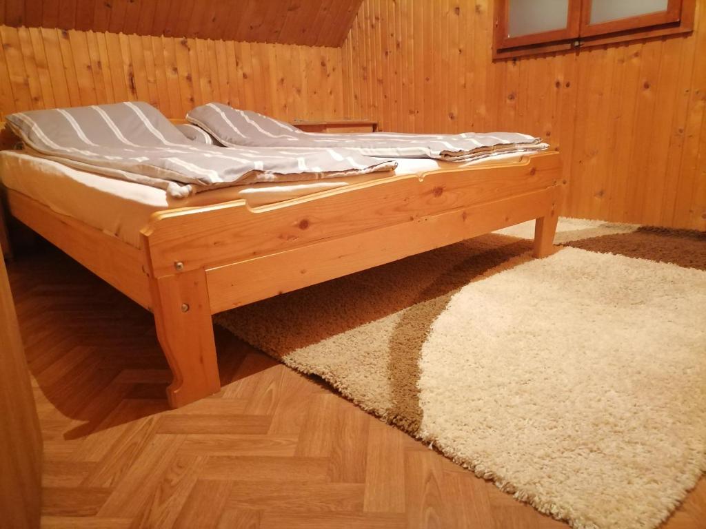 Postel nebo postele na pokoji v ubytování VUK sobe