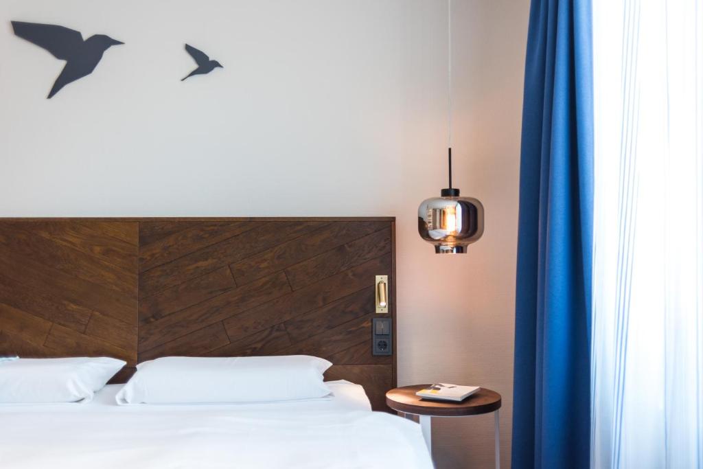 Postel nebo postele na pokoji v ubytování Romantik Hotel Reichshof