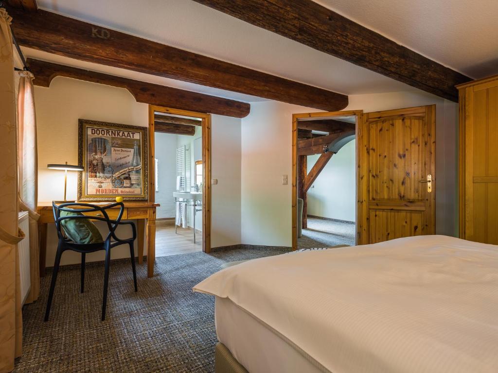 Postel nebo postele na pokoji v ubytování Romantik Hotel Reichshof