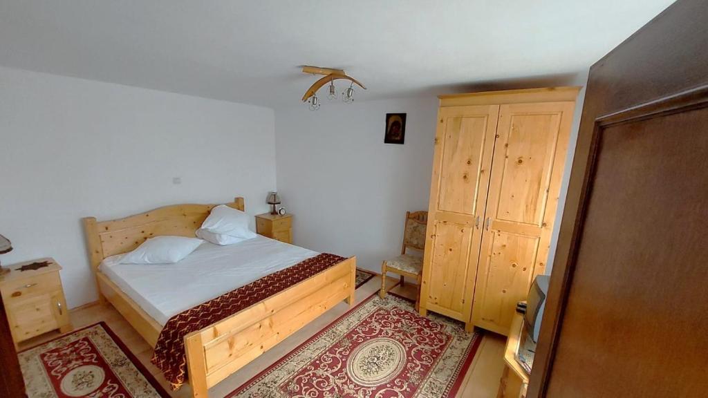 Postel nebo postele na pokoji v ubytování Casa Darius