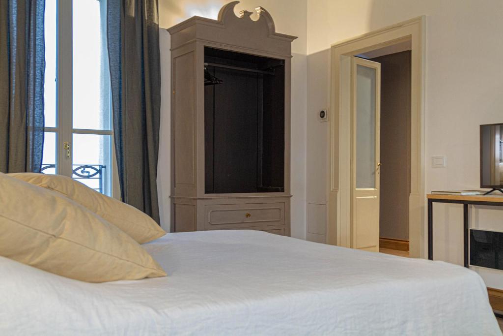 Posteľ alebo postele v izbe v ubytovaní Palazzo Glori 6