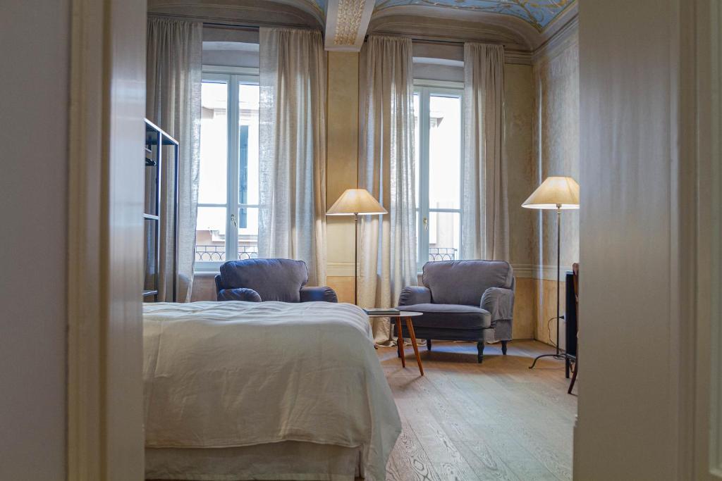Posteľ alebo postele v izbe v ubytovaní Palazzo Glori 6