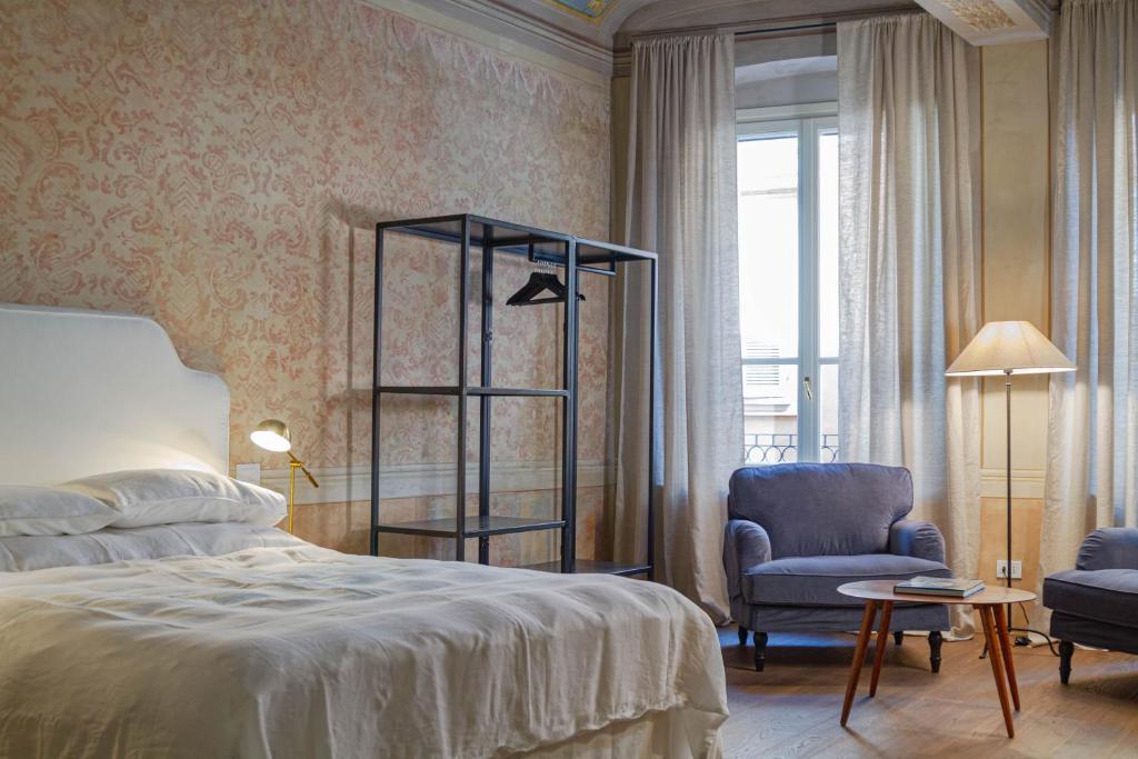 Posteľ alebo postele v izbe v ubytovaní Palazzo Glori 6