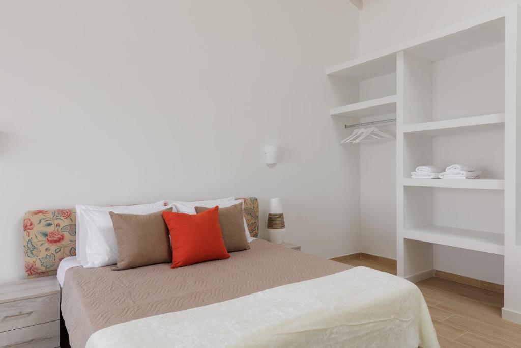 Postel nebo postele na pokoji v ubytování Nisos Villas Corfu