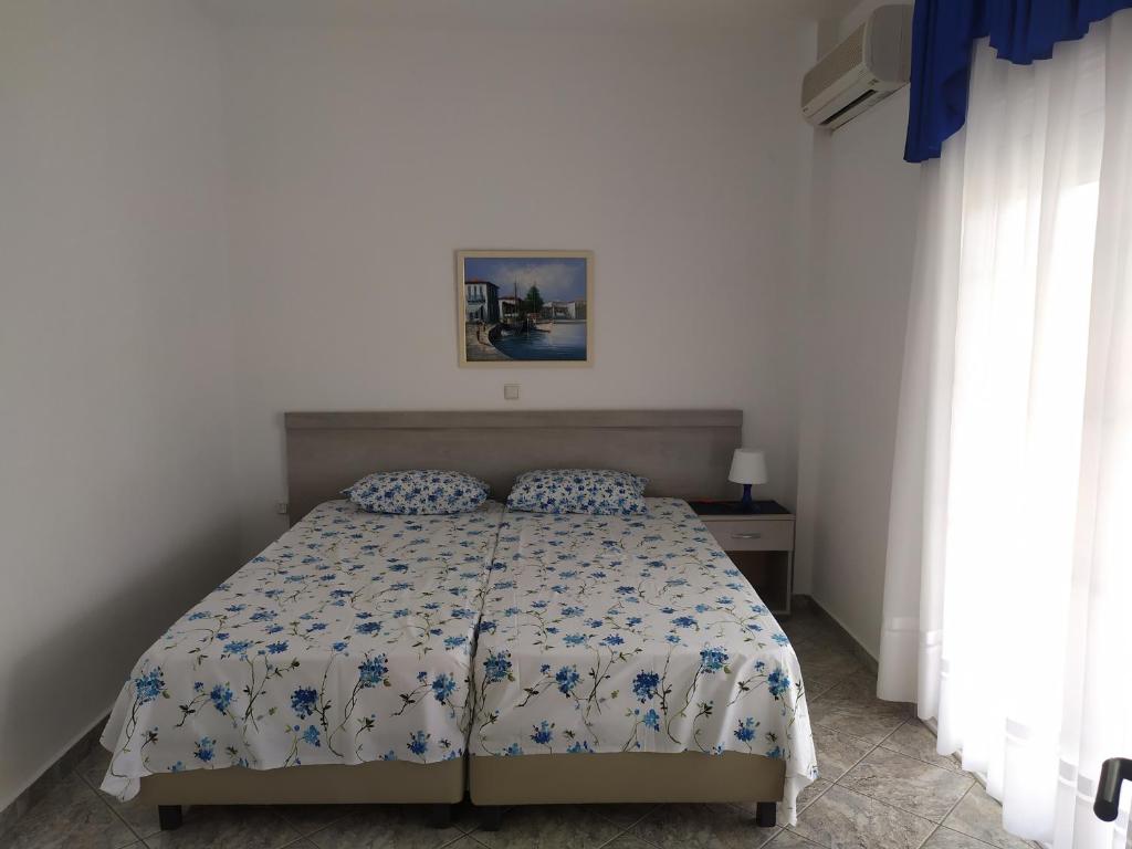 Postel nebo postele na pokoji v ubytování Panorama Apartments