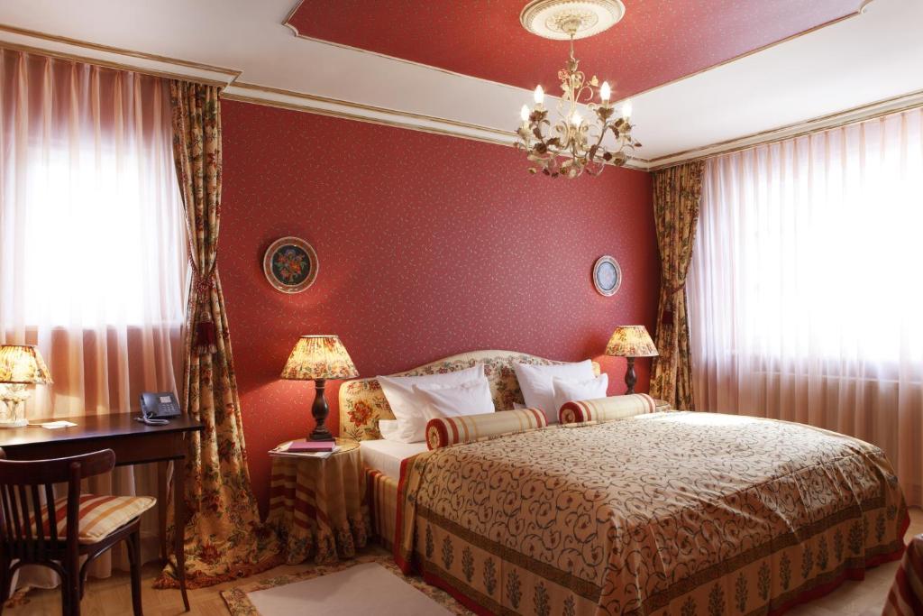 Postel nebo postele na pokoji v ubytování Hotel Goldener Anker