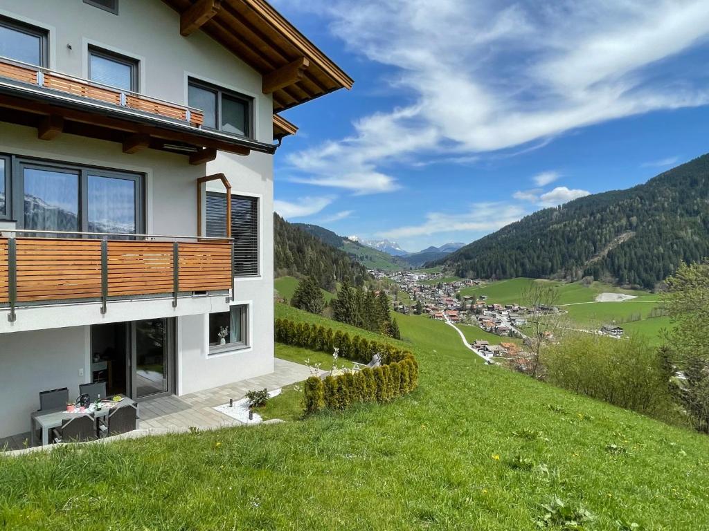 a house on a hill with a view at Apartment Bergblick - WIL110 by Interhome in Oberau