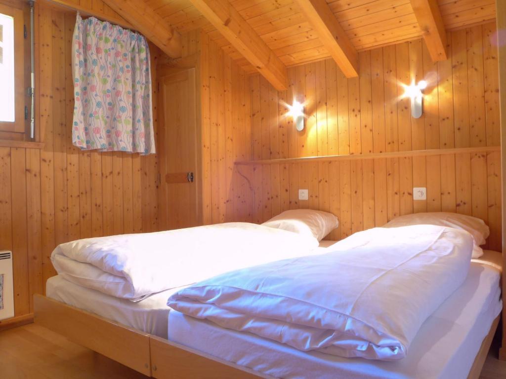 Postel nebo postele na pokoji v ubytování Apartment Baudrier A28 by Interhome