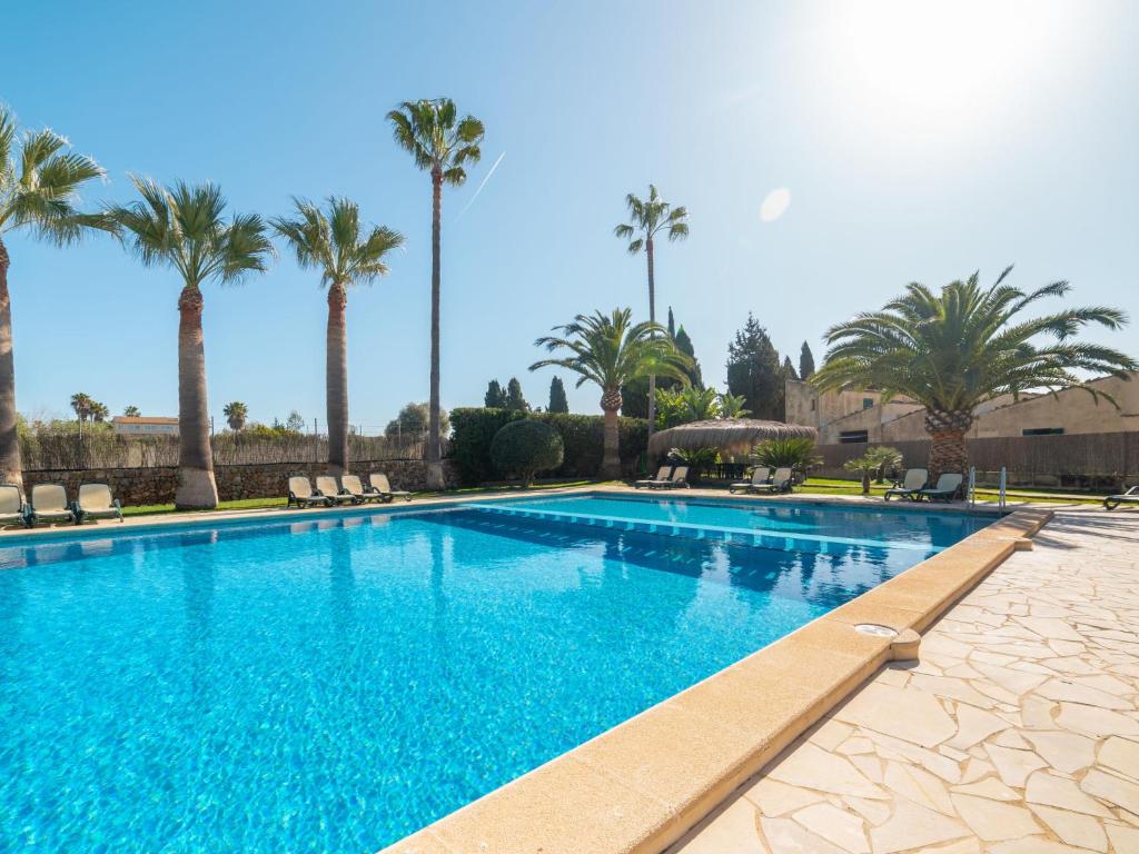 The swimming pool at or close to Apartment Finca Can Corritx-1 by Interhome