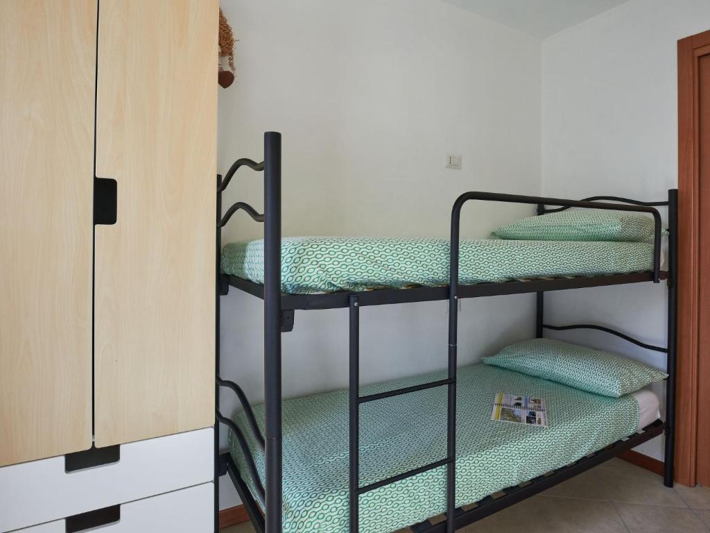 Łóżko lub łóżka w pokoju w obiekcie Apartment Livo - GRV556 by Interhome