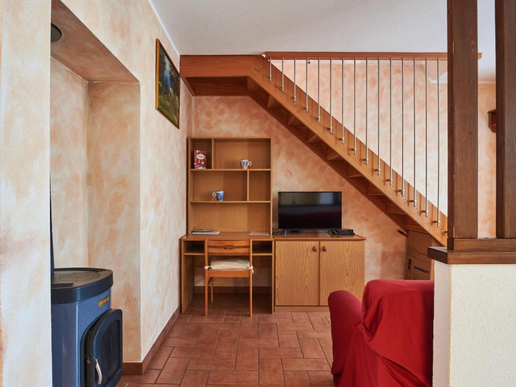 TV a/nebo společenská místnost v ubytování Holiday Home Leonardo by Interhome