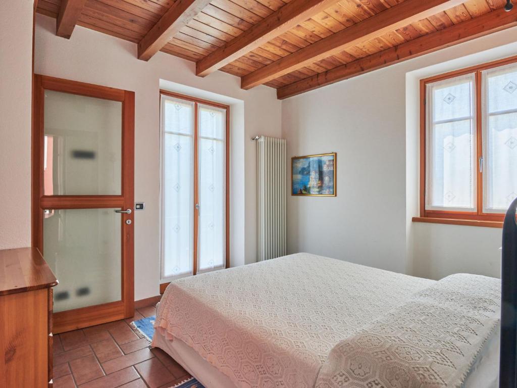 Postel nebo postele na pokoji v ubytování Holiday Home Leonardo by Interhome