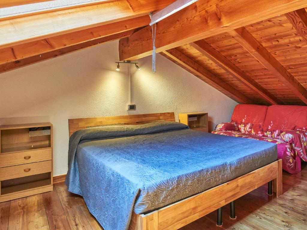 Postel nebo postele na pokoji v ubytování Holiday Home Leonardo by Interhome