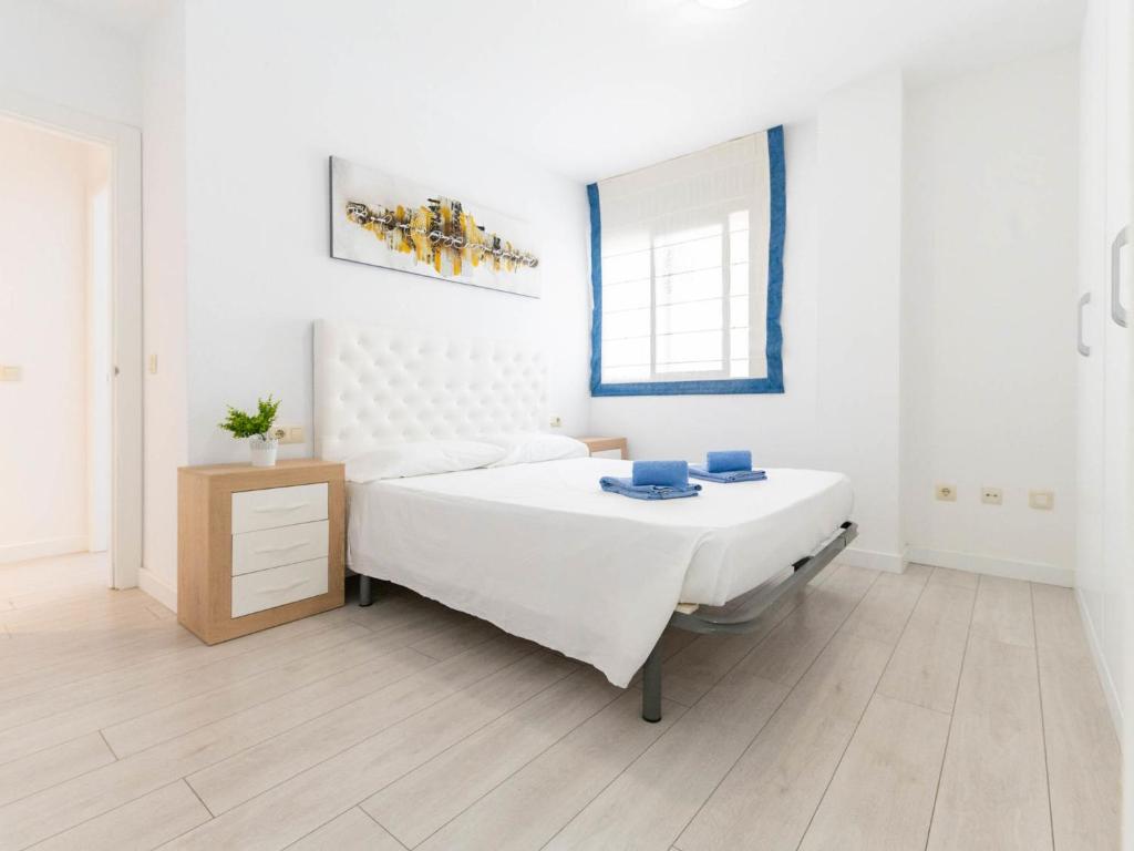 Postel nebo postele na pokoji v ubytování Apartment Edificio Blaucel by Interhome