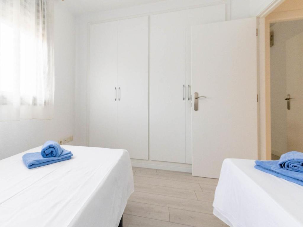 Postel nebo postele na pokoji v ubytování Apartment Edificio Blaucel by Interhome