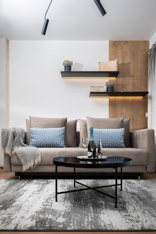Posezení v ubytování Napfény Resort Apartman