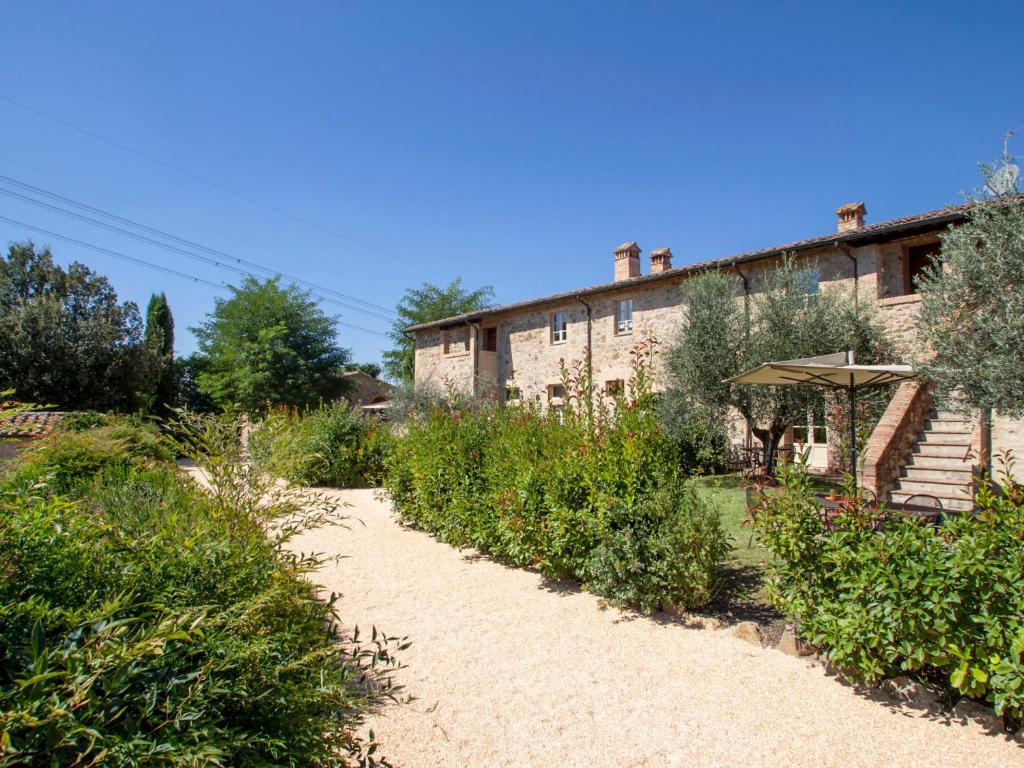 A garden outside Apartment Il Tino by Interhome