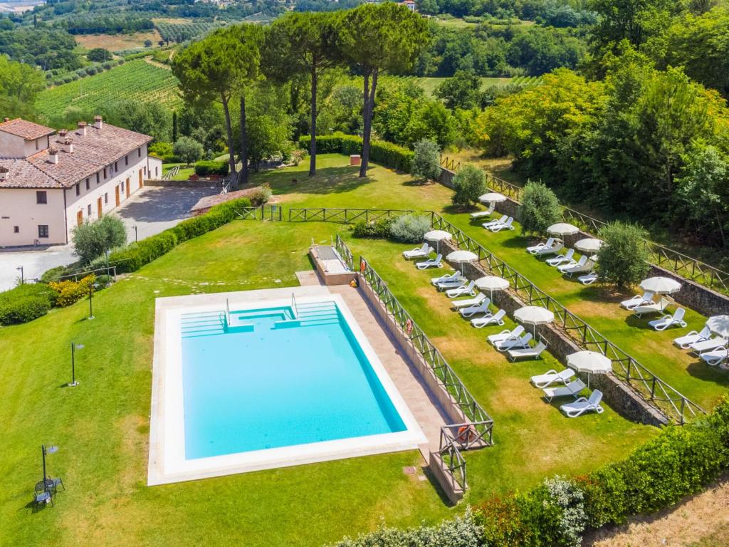 an aerial view of a backyard with a swimming pool at Apartment Francigena-5 by Interhome in Castelnuovo D'elsa