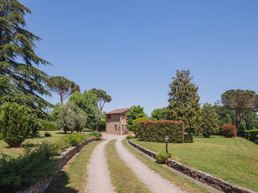 A garden outside Holiday Home Narciso by Interhome