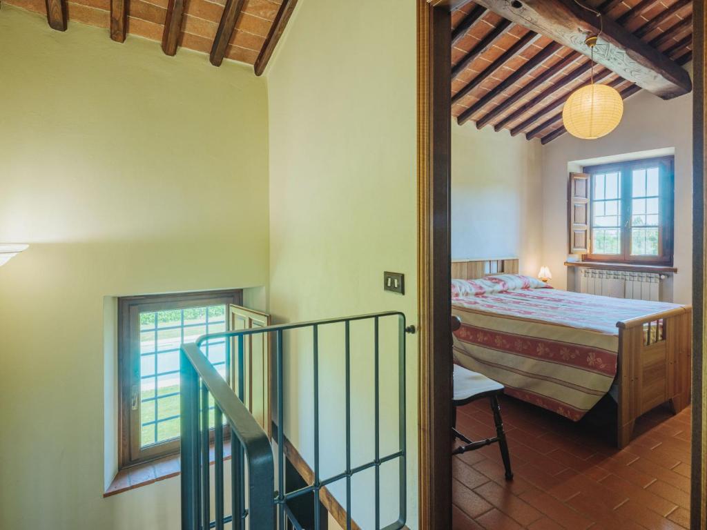 A bed or beds in a room at Holiday Home Narciso by Interhome