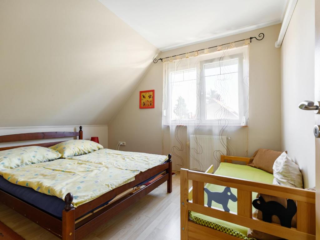A bed or beds in a room at Apartment Bocskai by Interhome