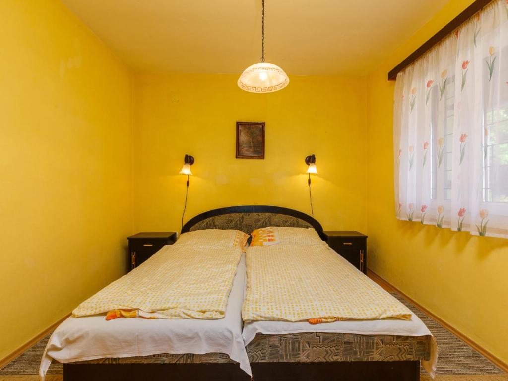 Postel nebo postele na pokoji v ubytování Holiday Home Panorama by Interhome