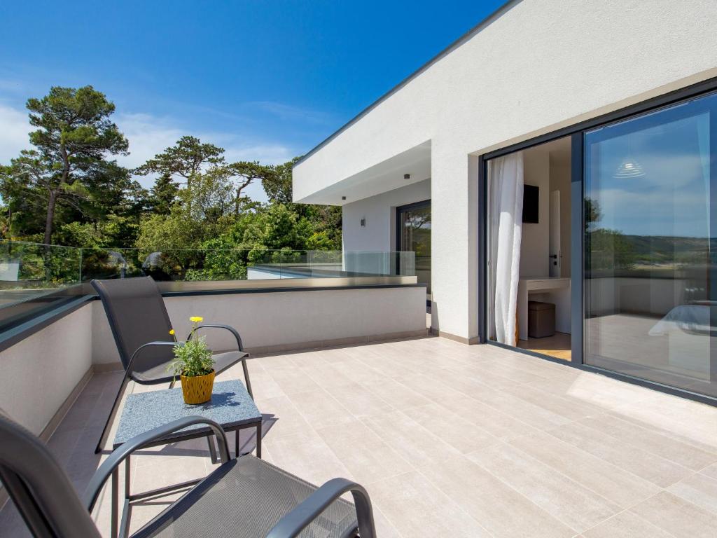 Balkón nebo terasa v ubytování Villa Pinnidae by Interhome