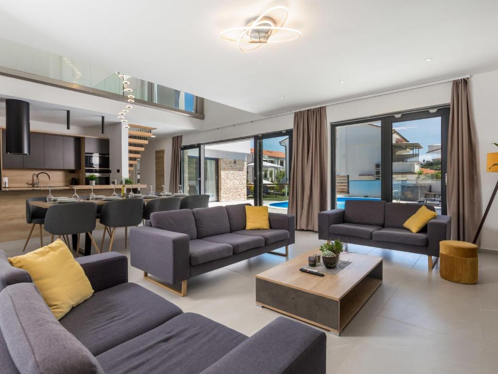 Posezení v ubytování Villa Pinnidae by Interhome