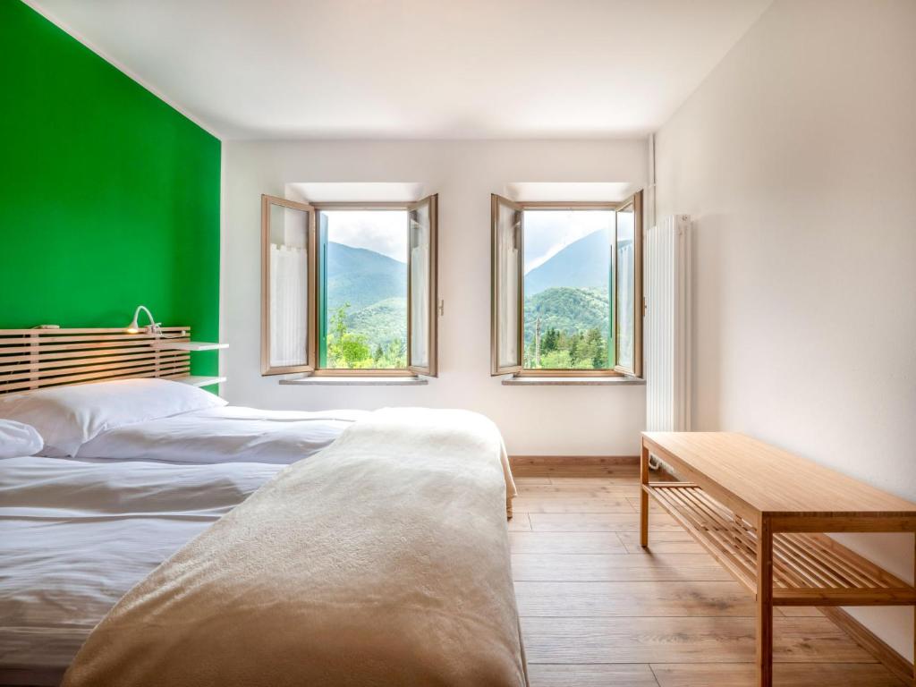 Postel nebo postele na pokoji v ubytování Holiday Home La Predaia by Interhome