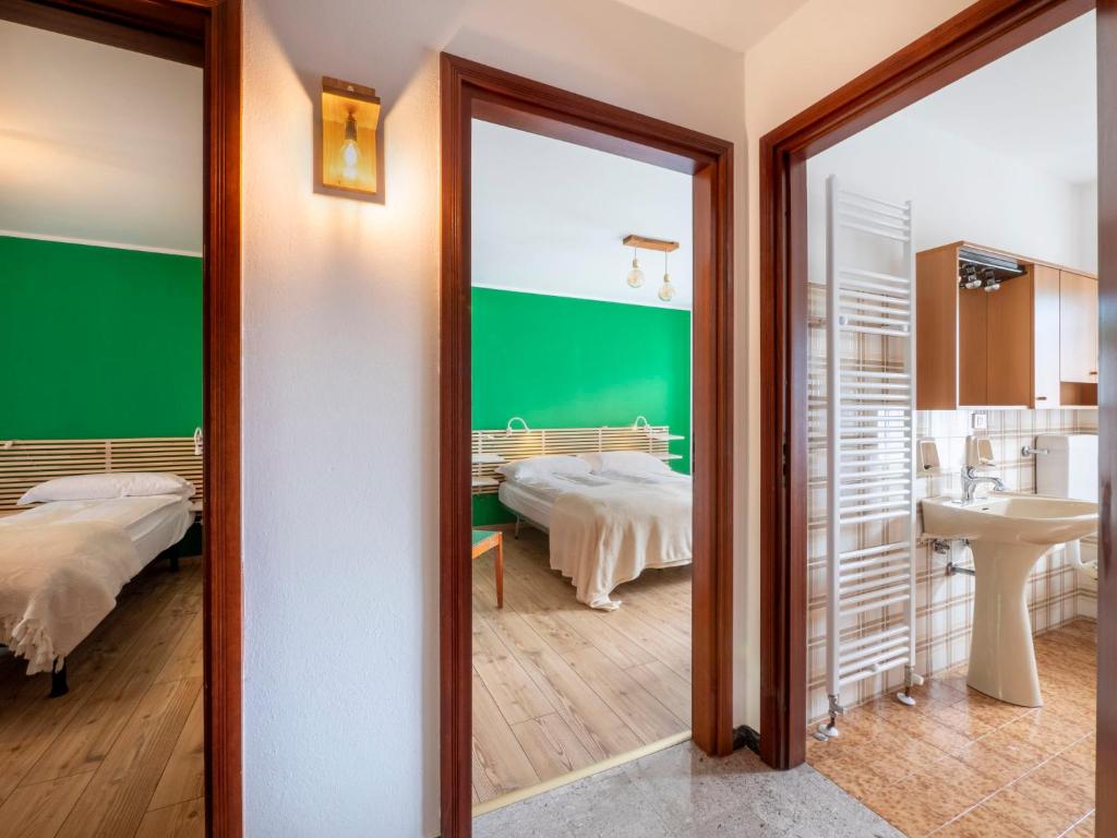 Postel nebo postele na pokoji v ubytování Holiday Home La Predaia by Interhome