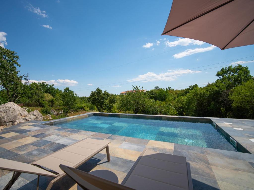Bazén v ubytovaní Apartment Kvarner house-2 by Interhome alebo v jeho blízkosti