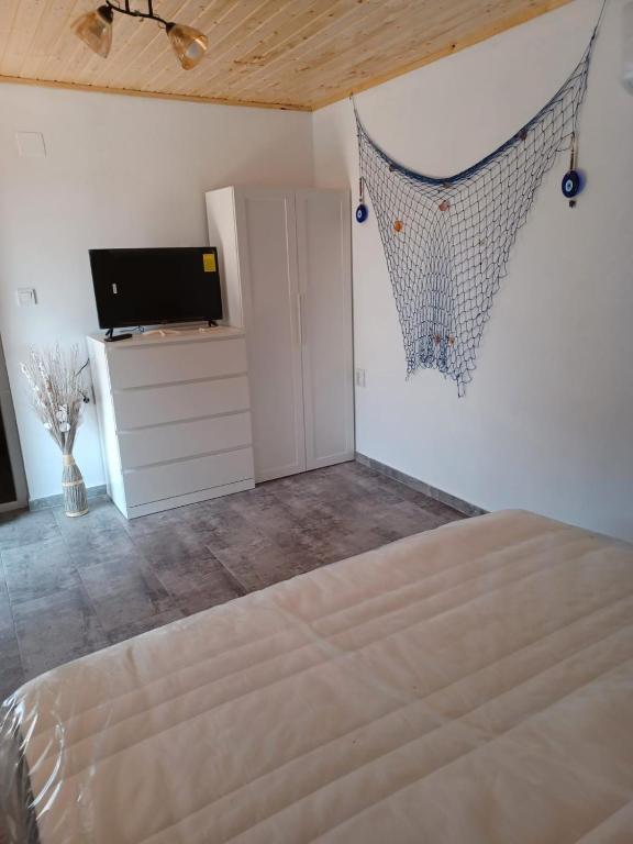 Postel nebo postele na pokoji v ubytování Talian