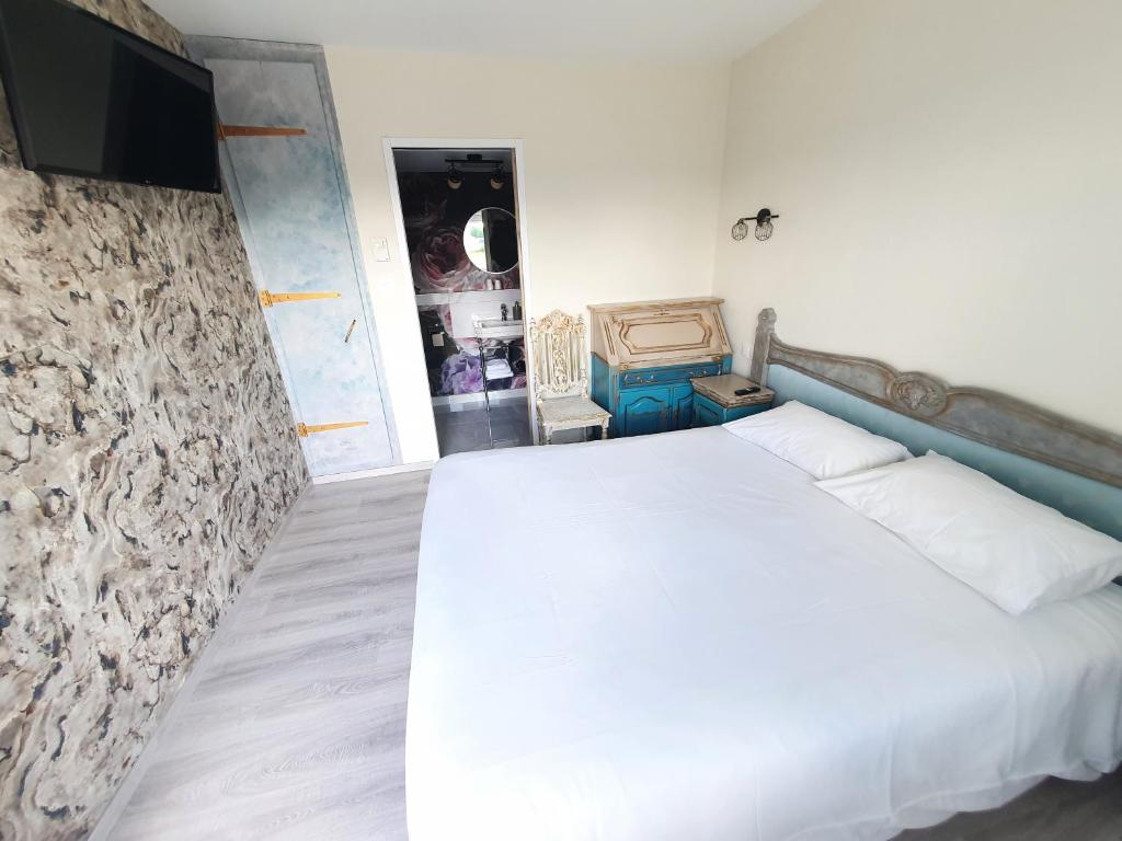Postel nebo postele na pokoji v ubytování Eqynox Hotel