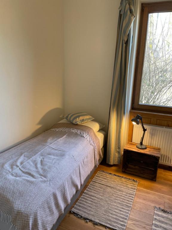 Postel nebo postele na pokoji v ubytování Schellnhof Forsthaus am Waldrand