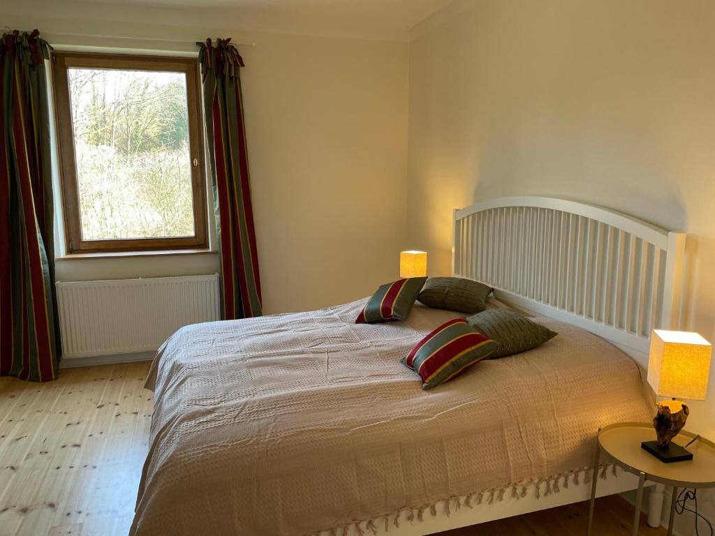 Postel nebo postele na pokoji v ubytování Schellnhof Forsthaus am Waldrand