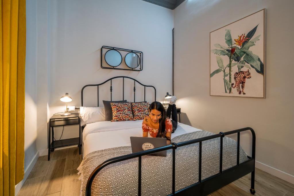 Posteľ alebo postele v izbe v ubytovaní The Venue Hostel Boutique
