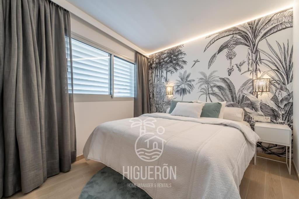 Posteľ alebo postele v izbe v ubytovaní HigueronRentals Wave