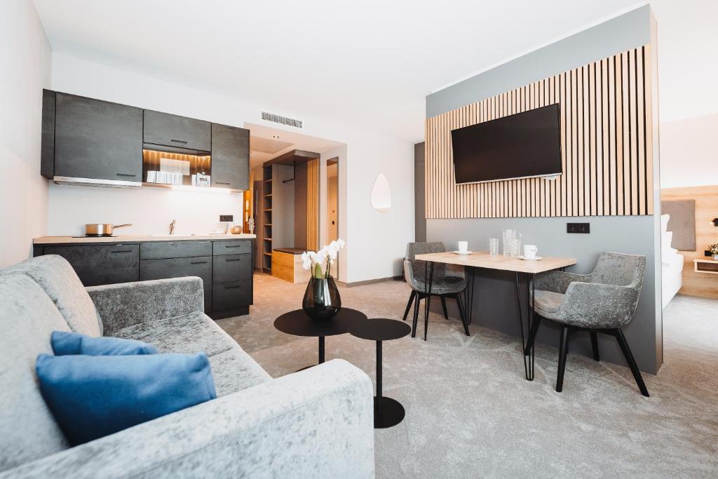 TV a/nebo společenská místnost v ubytování Hotel VIVO