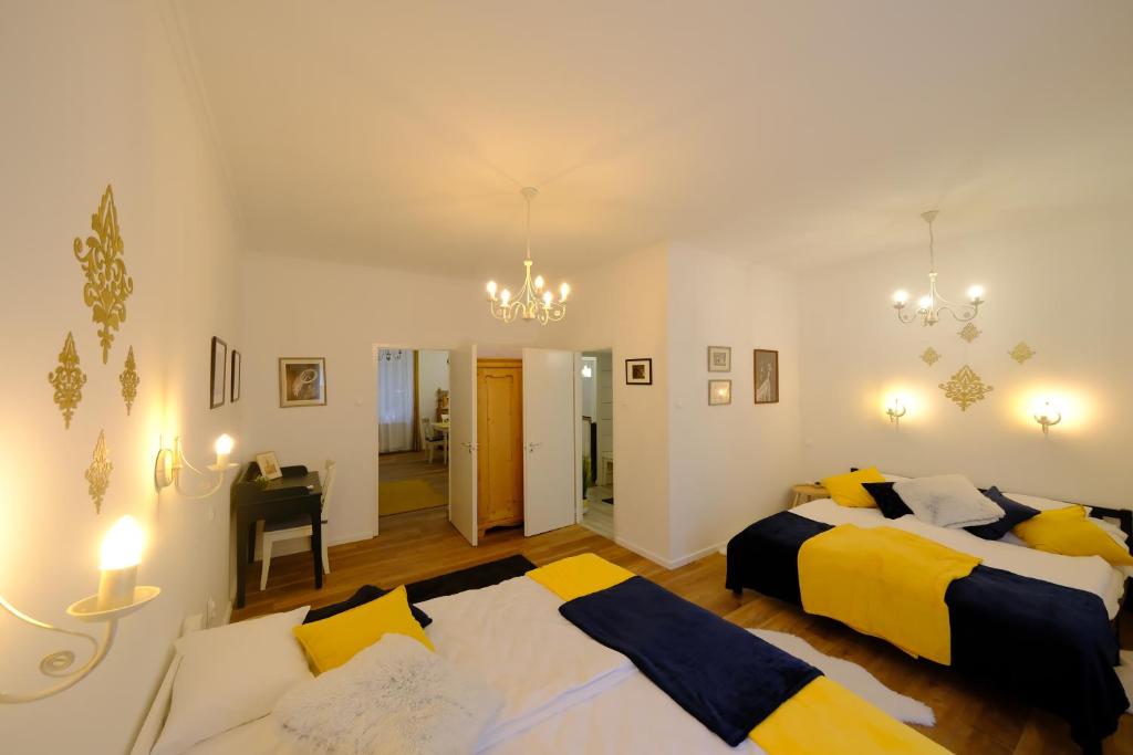 Postel nebo postele na pokoji v ubytování PéterPál apartman