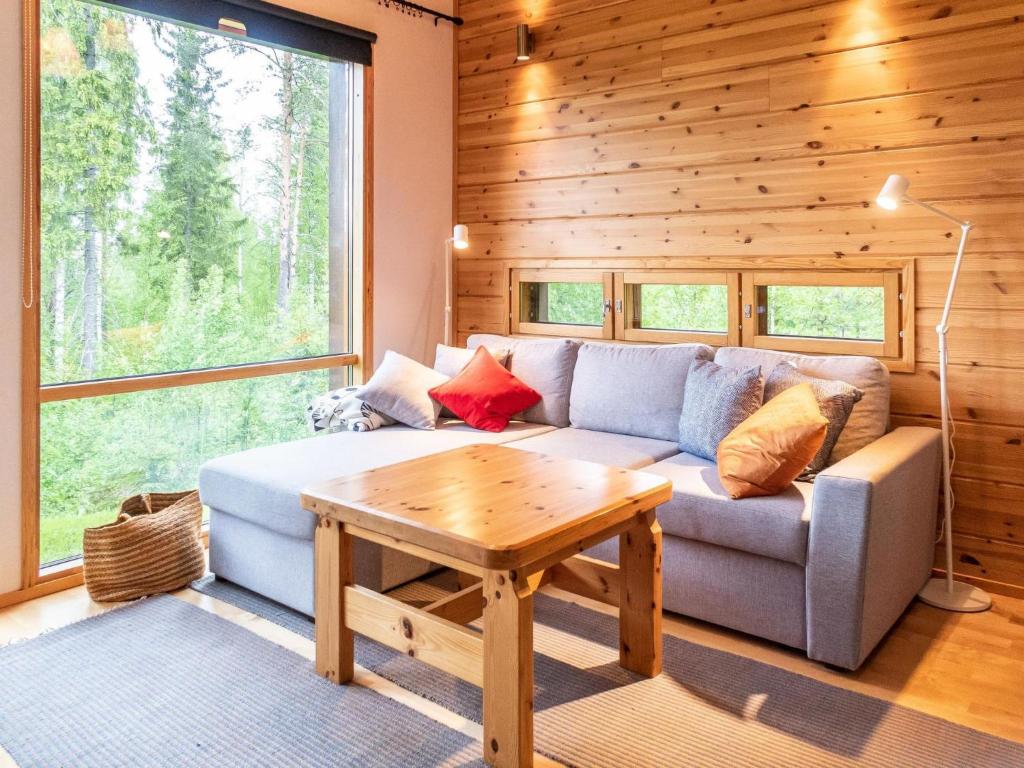 Posezení v ubytování Holiday Home Kanervarinne by Interhome