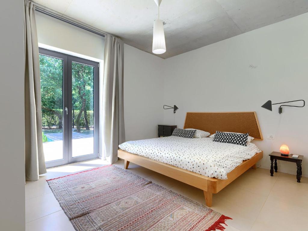 Łóżko lub łóżka w pokoju w obiekcie Holiday Home Villa Frleti by Interhome