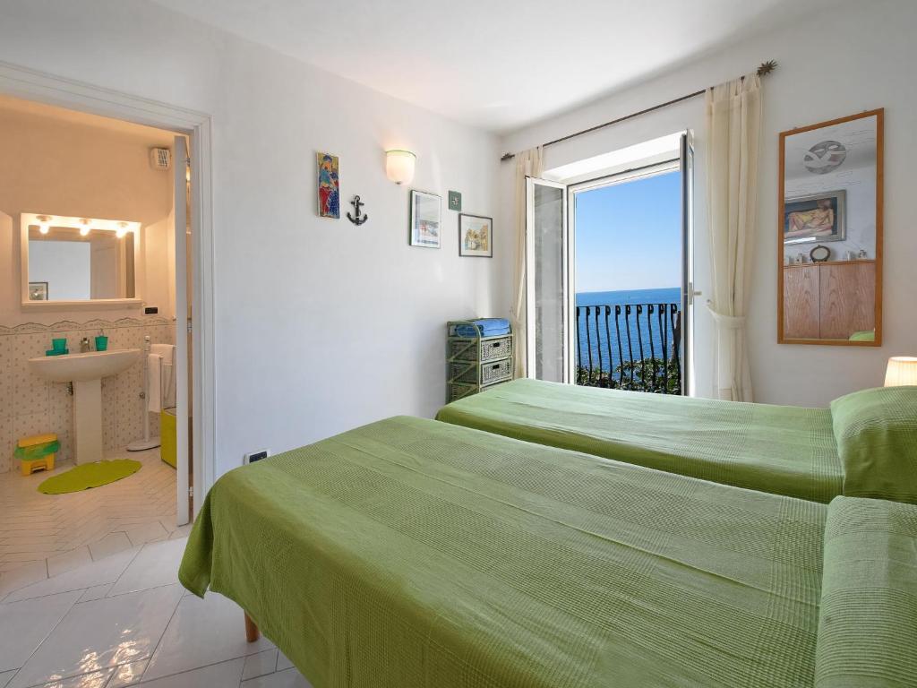 Posteľ alebo postele v izbe v ubytovaní Villa Il Corallo by Interhome