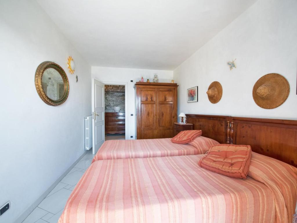 Posteľ alebo postele v izbe v ubytovaní Villa Il Corallo by Interhome