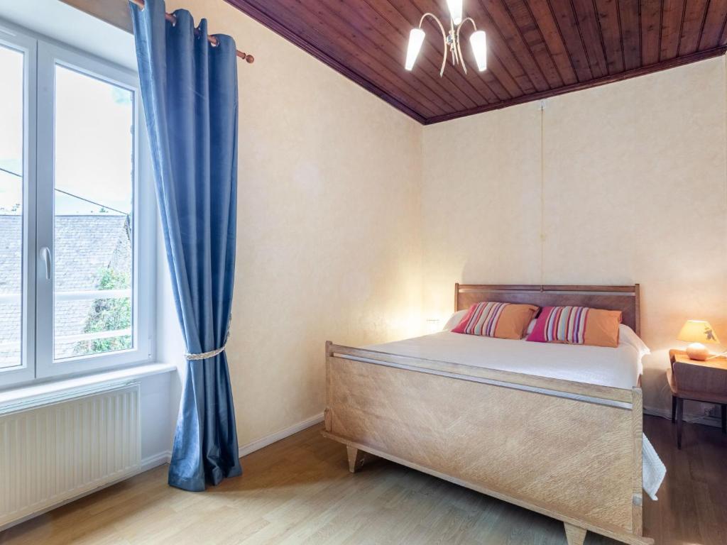 Łóżko lub łóżka w pokoju w obiekcie Holiday Home Le Bois Bourdin by Interhome
