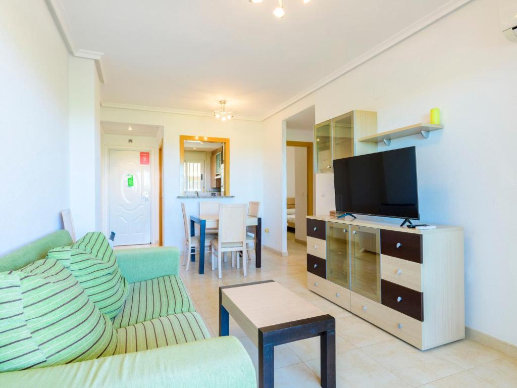 TV a/nebo společenská místnost v ubytování Apartment Jardines del Mar III - Marina d'Or-4 by Interhome