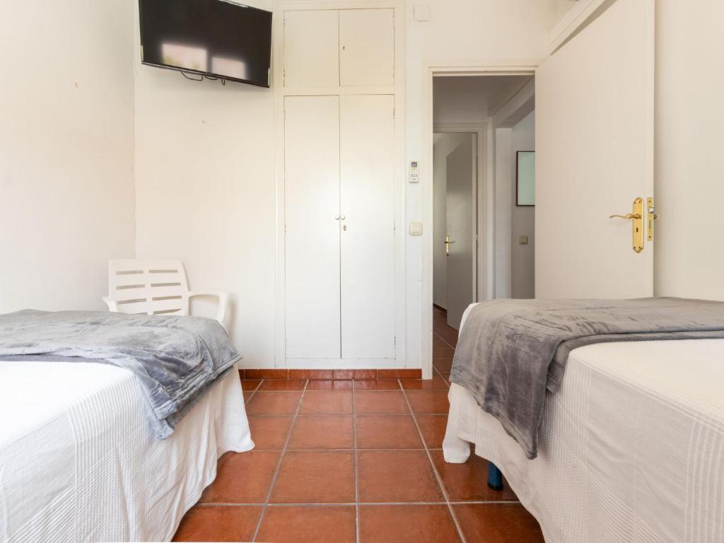Postel nebo postele na pokoji v ubytování Holiday Home Cantamar by Interhome